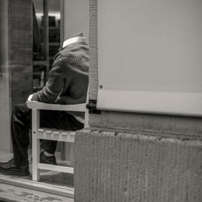 Headless dummy on bench in store