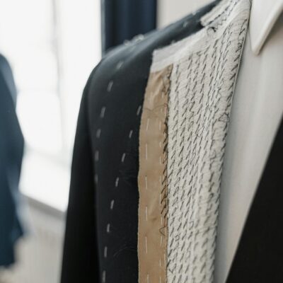 White and Yellow Textile on Black Chair